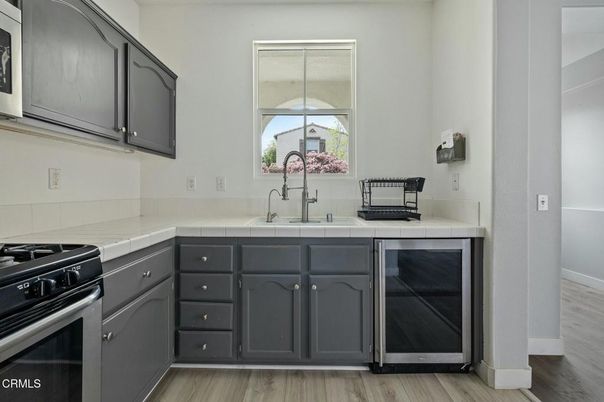 Interior, Kitchen, Tile Countertops, Wood Texture Flooring