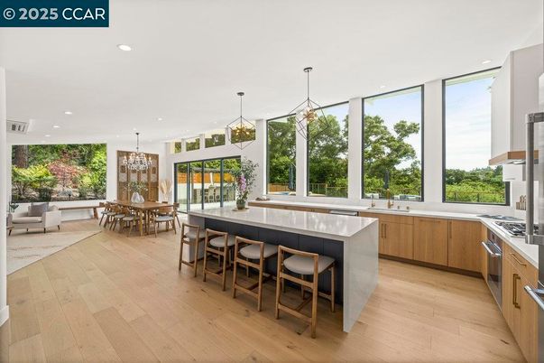 Chandelier, Dining room, Interior, Kitchen, Pendant Lights, Recessed Lighting, Stainless Steel Appliances, Wood Texture Flooring