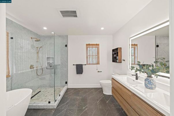 Bathroom, Dual Sink Vanities, Free Standing Baths, Glass Shower, Interior, Marble, Marble Walls, Recessed Lighting