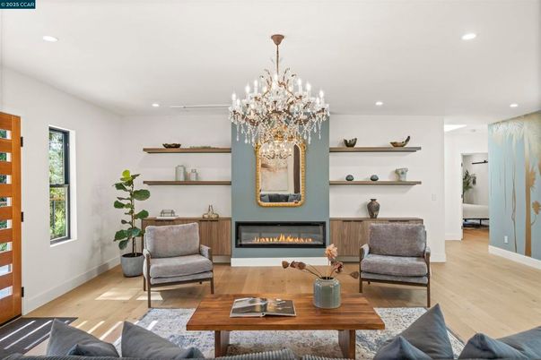 Chandelier, Fireplace, Interior, Living room, Recessed Lighting, Wood Texture Flooring