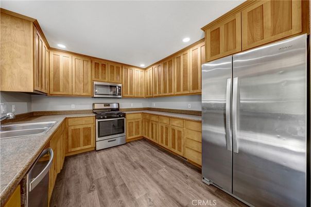 Interior, Kitchen, Recessed Lighting, Stainless Steel Appliances, Wood Texture Flooring