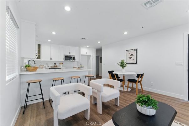 Dining room, Interior, Kitchen, Recessed Lighting, Stainless Steel Appliances, Wood Texture Flooring