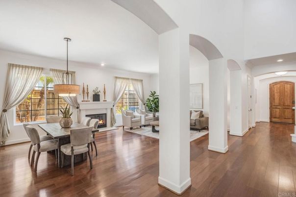 Dining room, Fireplace, Interior, Living room, Pendant Lights, Recessed Lighting, Wood Texture Flooring