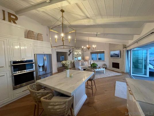 Chandelier, Dining room, Fireplace, Interior, Kitchen, Living room, Pendant Lights, Wood Texture Flooring