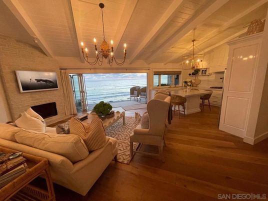 Chandelier, Dining room, Fireplace, Interior, Kitchen, Living room, Pendant Lights, Stone Walls, Wood Texture Flooring