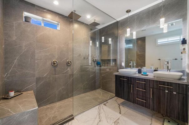 Bathroom, Dual Sink Vanities, Glass Shower, Interior, Marble, Pendant Lights, Recessed Lighting