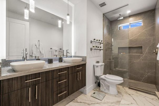 Bathroom, Dual Sink Vanities, Glass Shower, Interior, Marble, Pendant Lights, Recessed Lighting