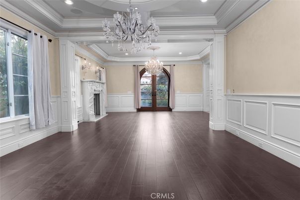 Chandelier, Empty room, Fireplace, Interior, Recessed Lighting, Wood Texture Flooring