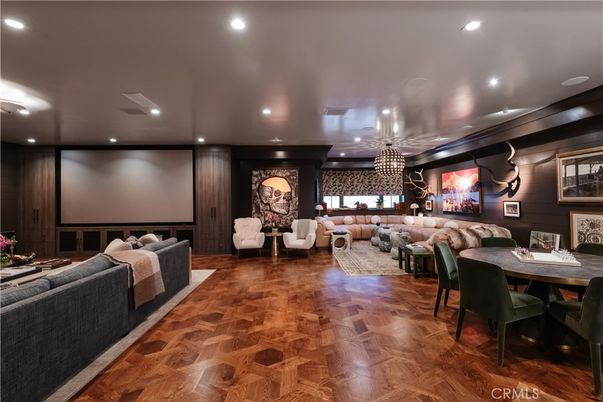 Dining room, Interior, Living room, Pendant Lights, Projection Screen, Recessed Lighting, Theatre Room, Wood Texture Flooring