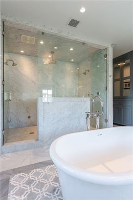 Bathroom, Free Standing Baths, Glass Shower, Interior, Marble, Marble Walls, Recessed Lighting