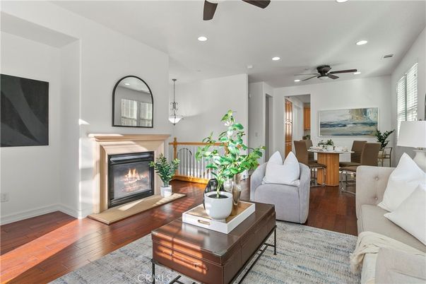 Dining room, Fireplace, Interior, Living room, Pendant Lights, Recessed Lighting, Wood Texture Flooring