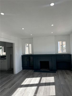 Empty room, Fireplace, Interior, Recessed Lighting, Wood Texture Flooring
