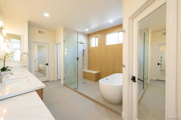 Bathroom, Dual Sink Vanities, Free Standing Baths, Glass Shower, Interior, Marble Walls, Recessed Lighting