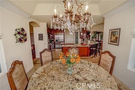 Chandelier, Dining room, Interior, Kitchen, Stainless Steel Appliances, Wood Texture Flooring