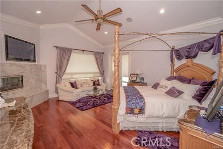 Bedroom, Fireplace, Interior, Recessed Lighting, Wood Texture Flooring