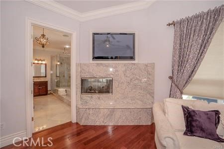 Bathroom, Chandelier, Fireplace, Interior, Wood Texture Flooring