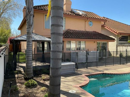 Exterior, Pool, Solar Panels