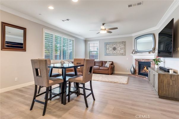 Dining room, Fireplace, Interior, Living room, Recessed Lighting, Wood Texture Flooring
