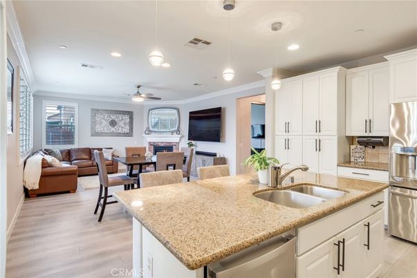 Dining room, Interior, Kitchen, Living room, Pendant Lights, Recessed Lighting, Stainless Steel Appliances, Wood Texture Flooring