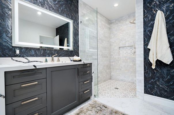 Bathroom, Dual Sink Vanities, Glass Shower, Interior, Marble, Marble Walls, Recessed Lighting