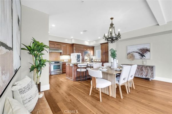 Chandelier, Dining room, Interior, Kitchen, Recessed Lighting, Stainless Steel Appliances, Wood Texture Flooring