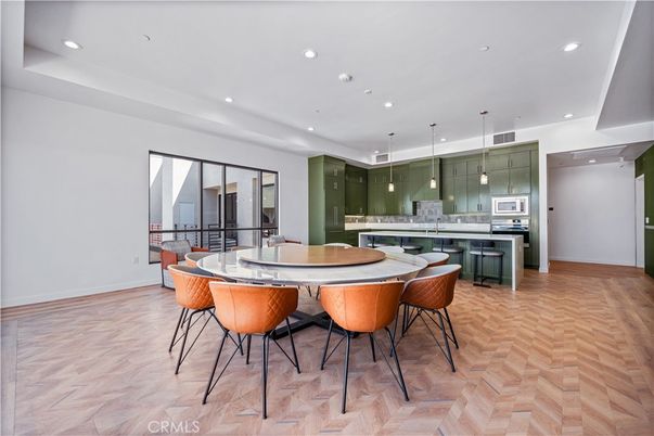 Dining room, Interior, Kitchen, Pendant Lights, Recessed Lighting, Stainless Steel Appliances, Wood Texture Flooring