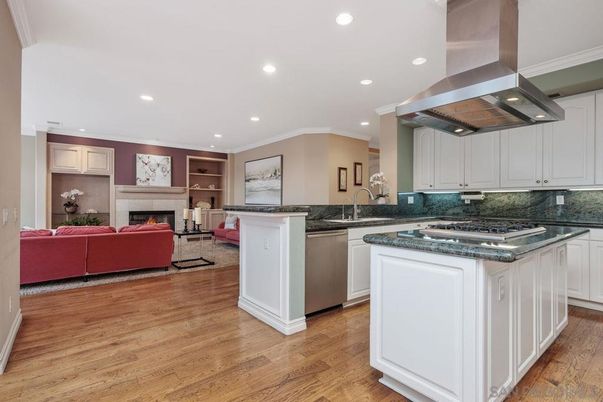Fireplace, Interior, Kitchen, Living room, Recessed Lighting, Stainless Steel Appliances, Wood Texture Flooring
