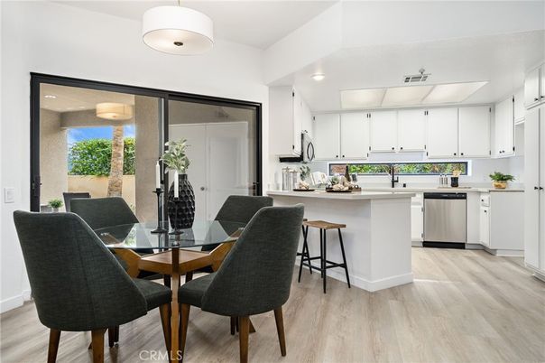 Dining room, Interior, Kitchen, Pendant Lights, Recessed Lighting, Stainless Steel Appliances, Wood Texture Flooring