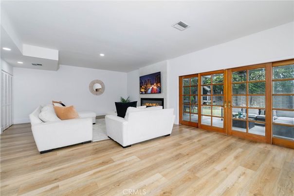 Fireplace, Interior, Living room, Recessed Lighting, Wood Texture Flooring