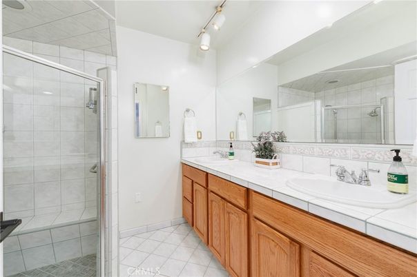Bathroom, Dual Sink Vanities, Glass Shower, Interior, Tile Countertops