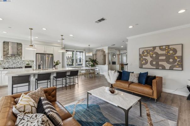 Dining room, Interior, Kitchen, Living room, Pendant Lights, Recessed Lighting, Stainless Steel Appliances, Wood Texture Flooring