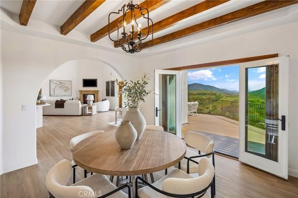 Chandelier, Dining room, Fireplace, Interior, Living room, Wooden Beams, Wood Texture Flooring