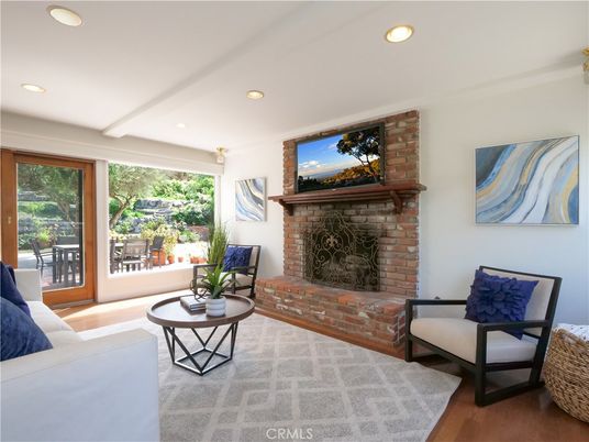 Fireplace, Interior, Living room, Recessed Lighting, Stone Walls, Wood Texture Flooring