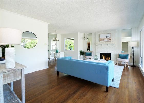 Chandelier, Dining room, Fireplace, Interior, Living room, Pendant Lights, Wood Texture Flooring