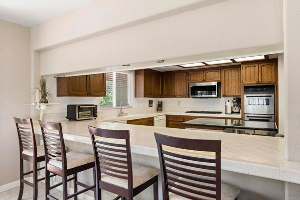 Interior, Kitchen, Stainless Steel Appliances, Tile Countertops