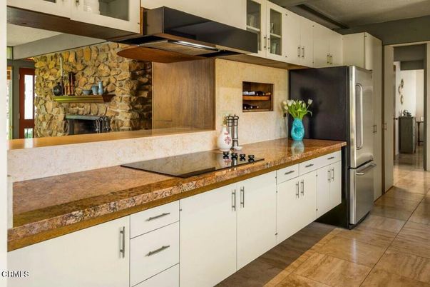 Fireplace, Interior, Kitchen, Stainless Steel Appliances, Stone Walls