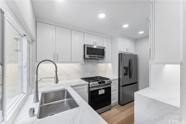 Interior, Kitchen, Recessed Lighting, Stainless Steel Appliances, Wood Texture Flooring