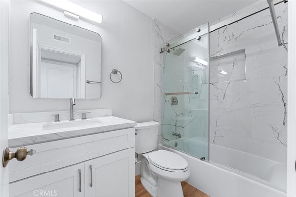 Bathroom, Glass Shower, Interior, Marble Walls, Wood Texture Flooring