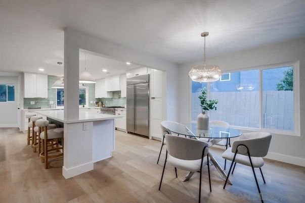 Chandelier, Dining room, Interior, Kitchen, Pendant Lights, Recessed Lighting, Stainless Steel Appliances, Wood Texture Flooring
