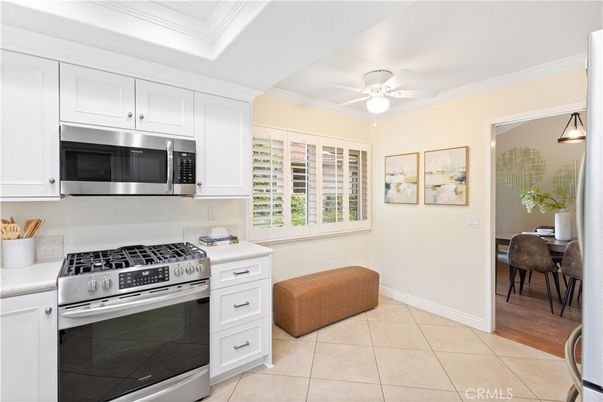 Dining room, Interior, Kitchen, Pendant Lights, Stainless Steel Appliances, Wood Texture Flooring