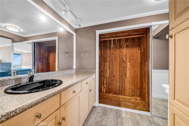 Bathroom, Dual Sink Vanities, Glass Shower, Interior, Wood Texture Flooring, Wooden Walls