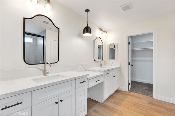Bathroom, Dual Sink Vanities, Interior, Pendant Lights, Wood Texture Flooring