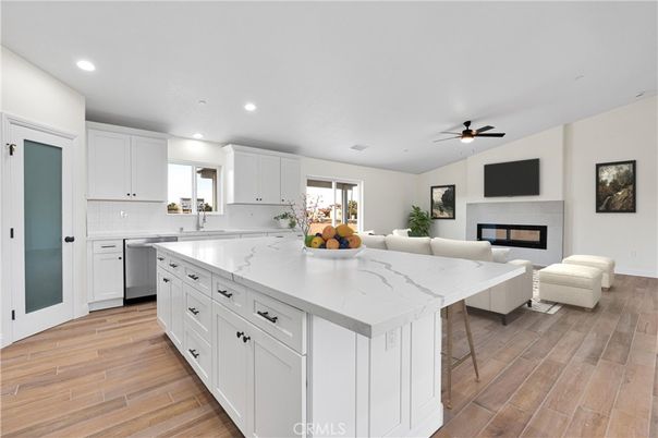 Fireplace, Interior, Kitchen, Living room, Recessed Lighting, Wood Texture Flooring