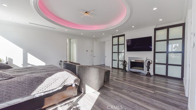 Bedroom, Fireplace, Interior, Recessed Lighting, Wood Texture Flooring