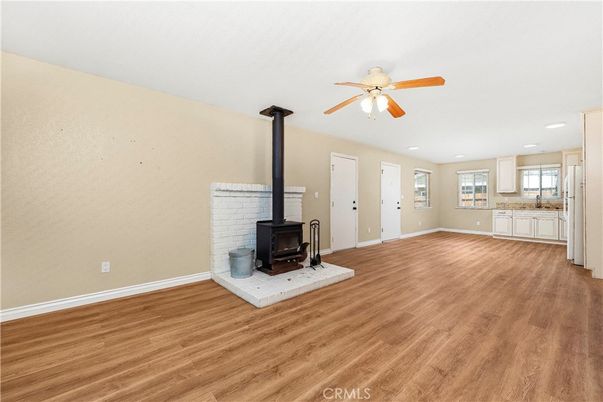 Empty room, Fireplace, Interior, Recessed Lighting, Wood Texture Flooring