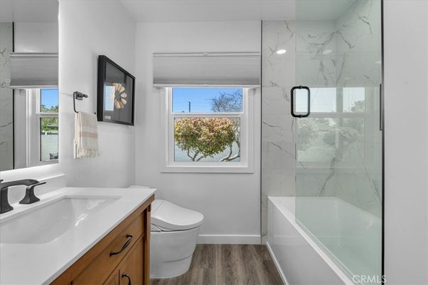 Bathroom, Glass Shower, Interior, Marble Walls, Wood Texture Flooring