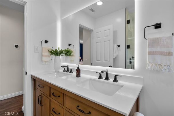 Bathroom, Dual Sink Vanities, Interior, Recessed Lighting, Wood Texture Flooring