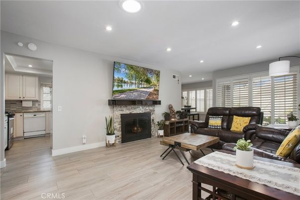 Fireplace, Interior, Kitchen, Living room, Recessed Lighting, Wood Texture Flooring