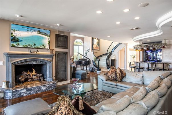Dining room, Fireplace, Interior, Living room, Piano, Recessed Lighting, Wood Texture Flooring