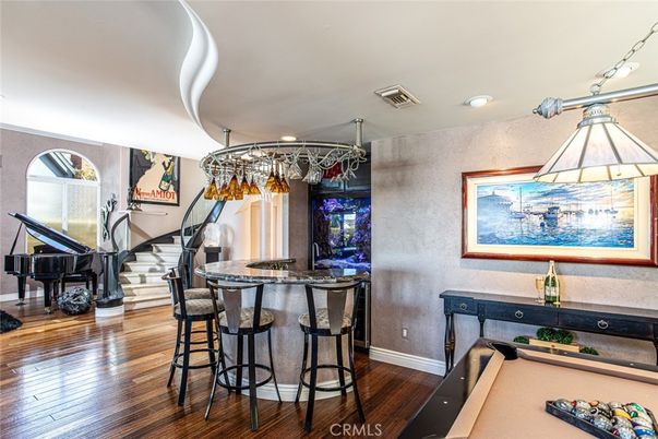Chandelier, Game Room, Interior, Piano, Recessed Lighting, Wood Texture Flooring